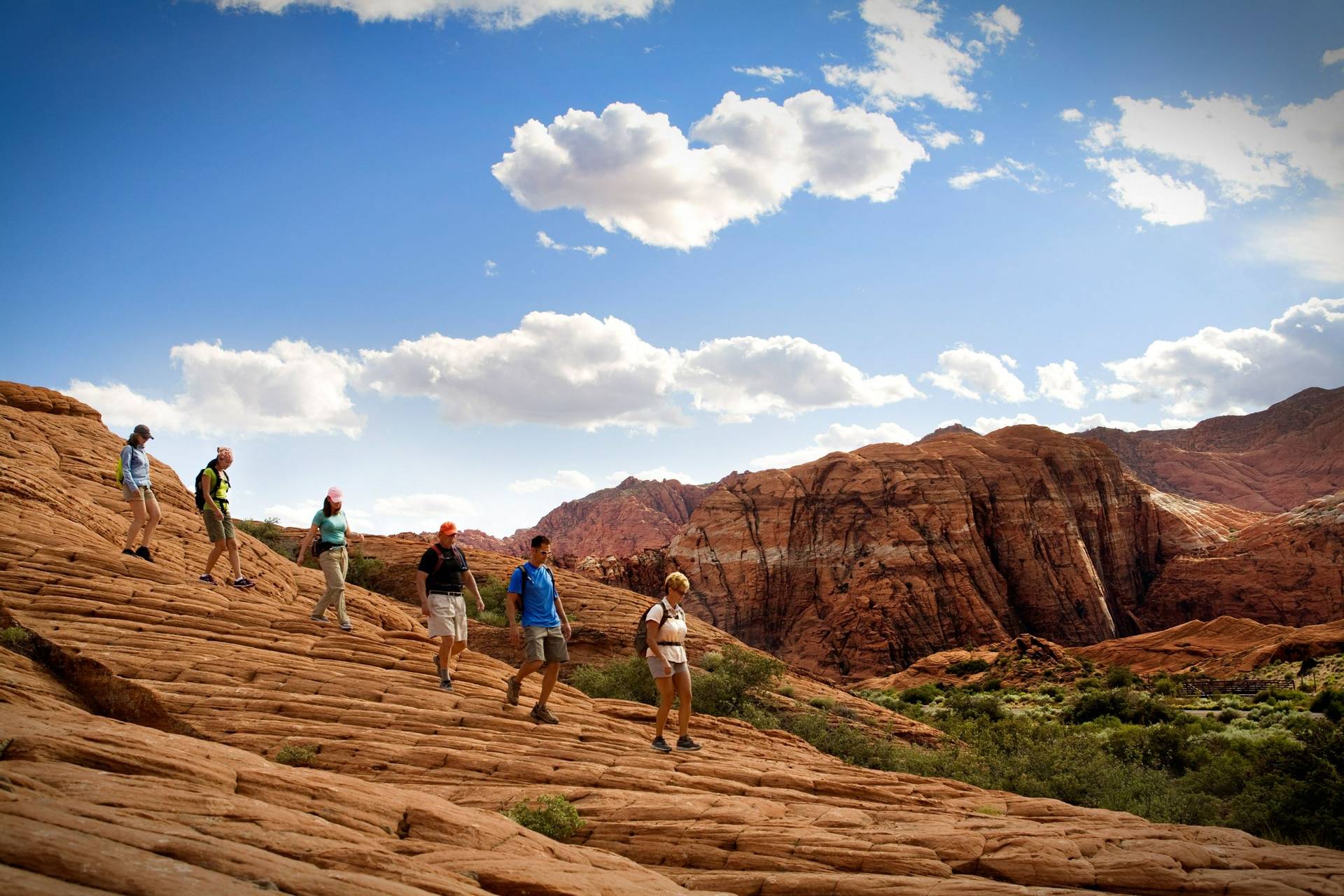 five hikers on ridge red mountain resort